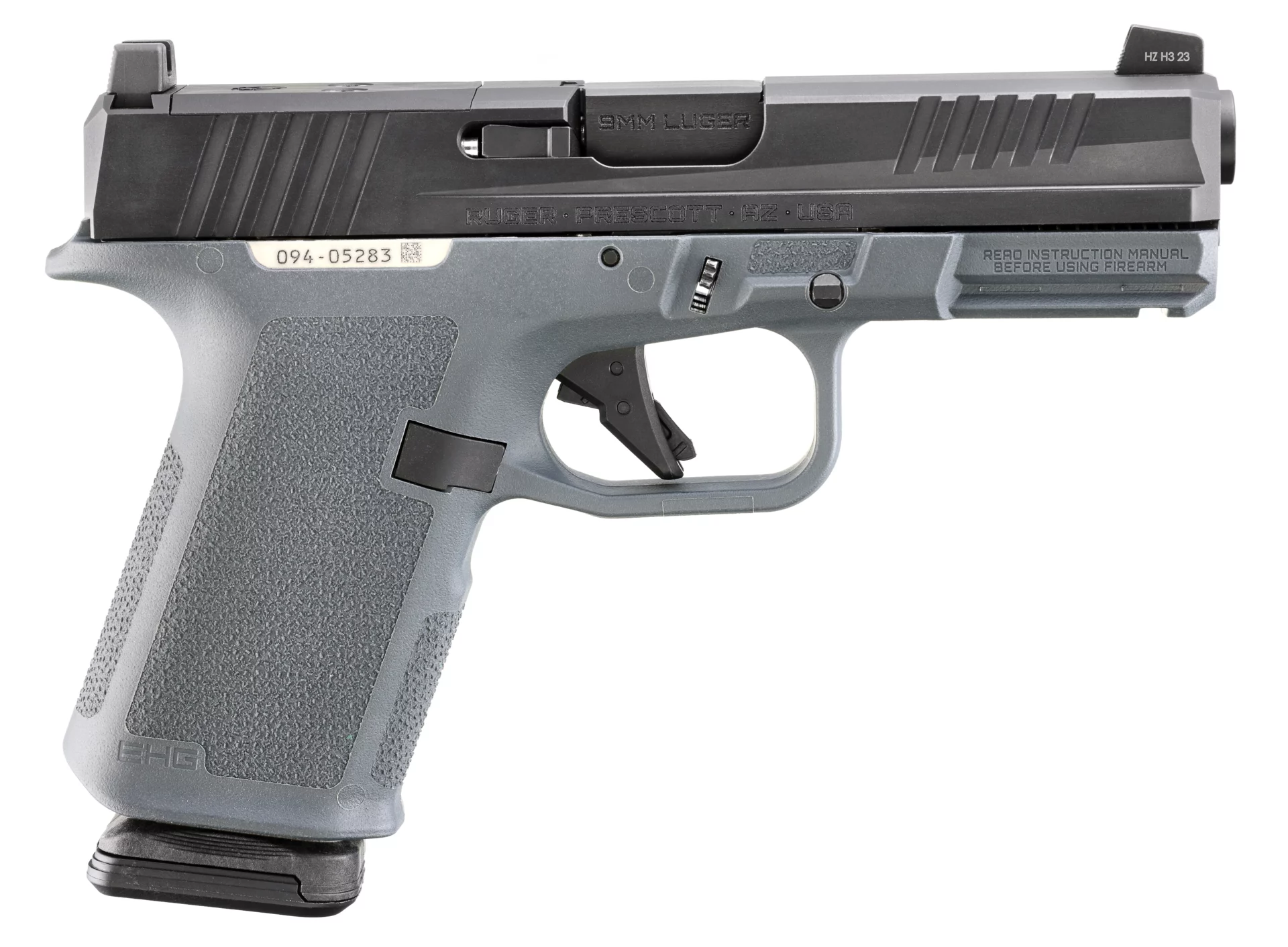 Ruger RXM 9mm pistol with 4-inch barrel, black slide, gray polymer frame, adjustable sights, and 15-round magazine